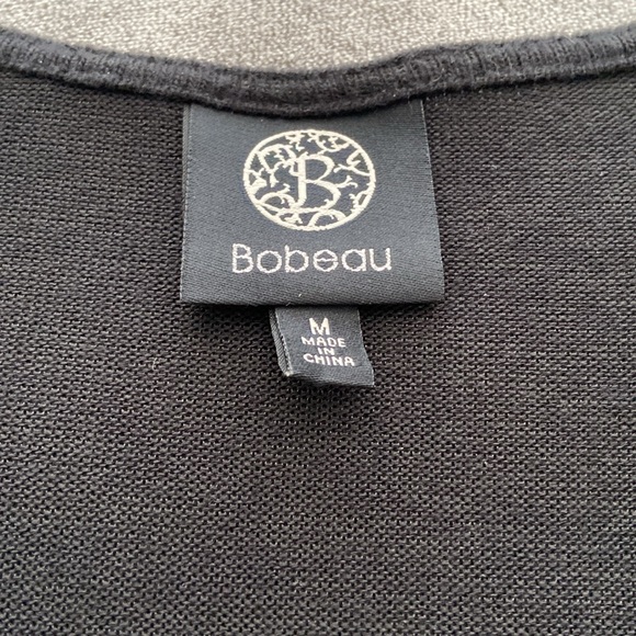 Black and tan mid leg sweater.  Perfect either way jeans and boots. - Picture 3 of 4